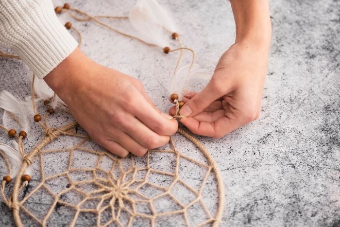 Transform simple materials into a stunning string art masterpiece.